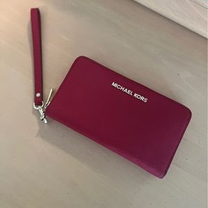 Michael Kors Zip Around Wallet in signature red color with wristlet loop